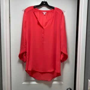 Bright orange/pink flowy top